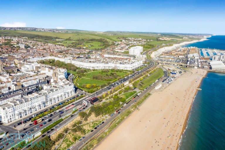 An aerial view of homes and the beach n Brighton