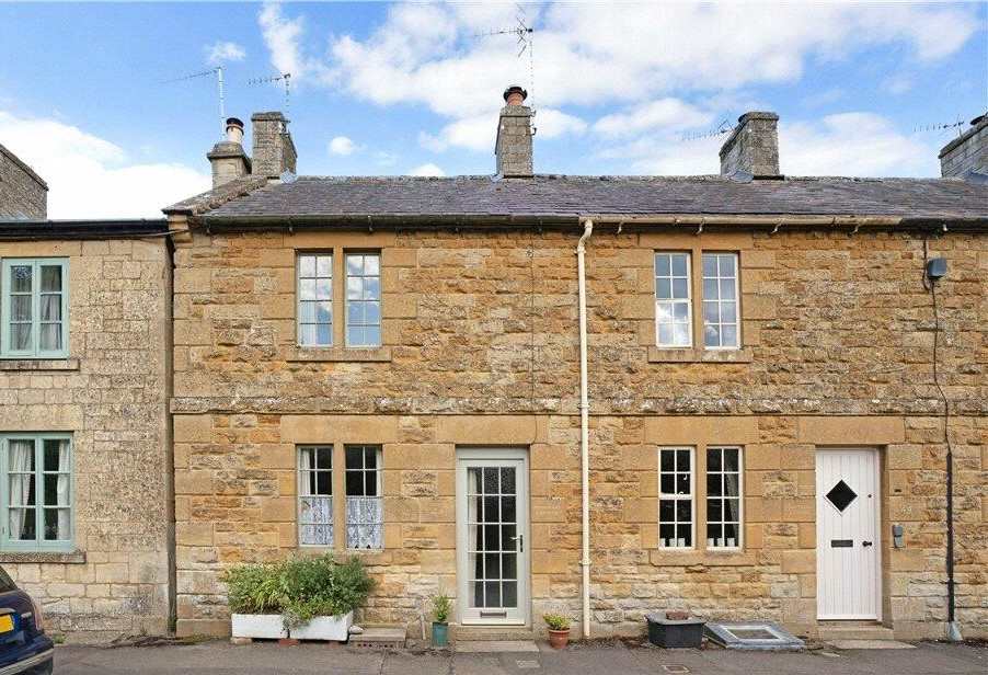 A terraced stone cottage