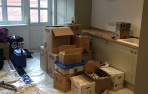 House move boxes in kitchen